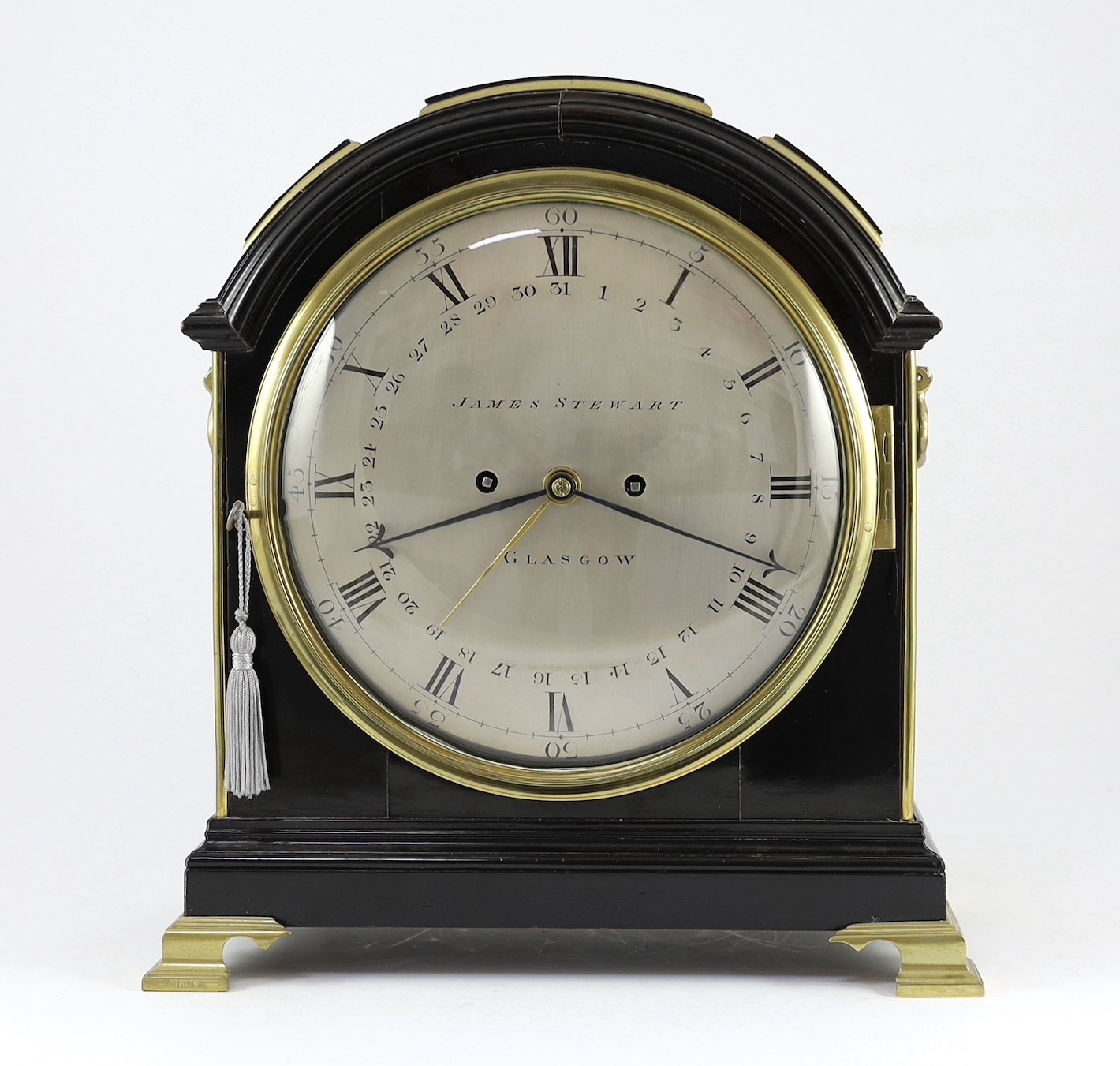 James Stewart of Glasgow. A Regency brass mounted ebonised bracket clock, 34cm wide 38cm high